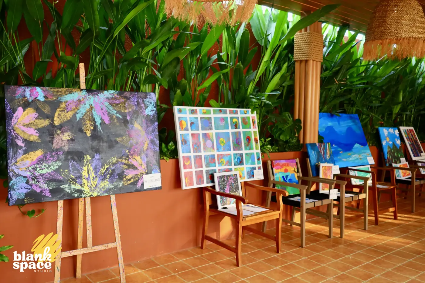 Artwork from summer camp on display at the charity art auction gallery