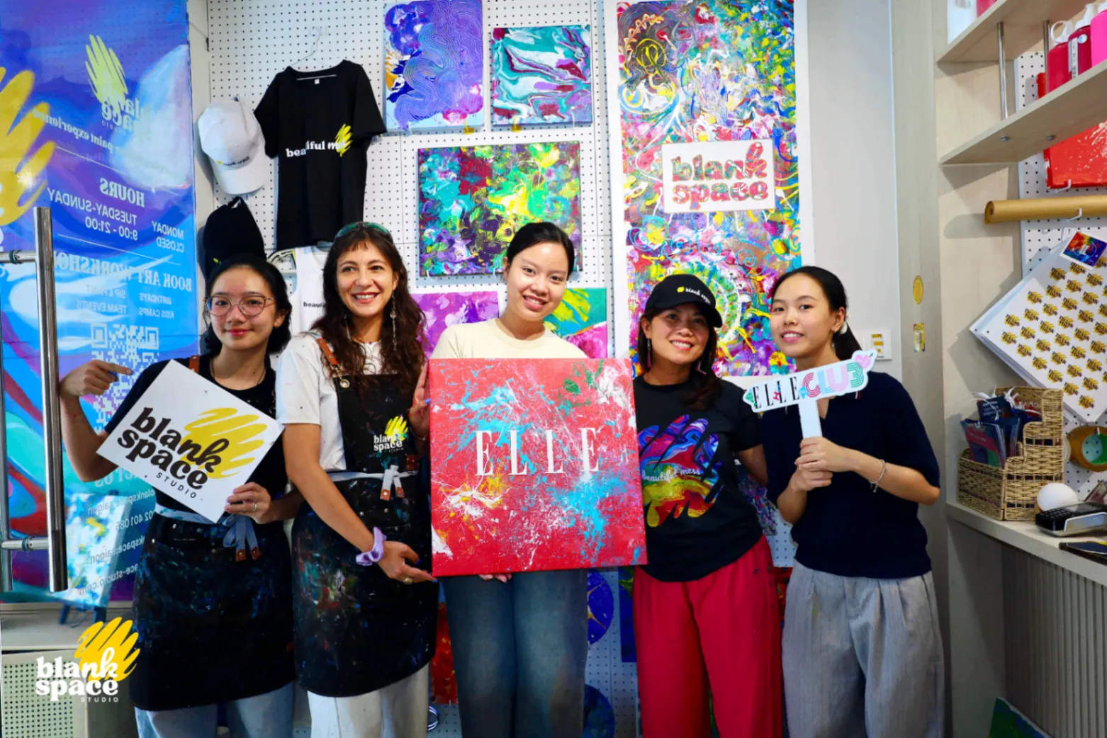 A team painting together at Blank Space Studio Saigon