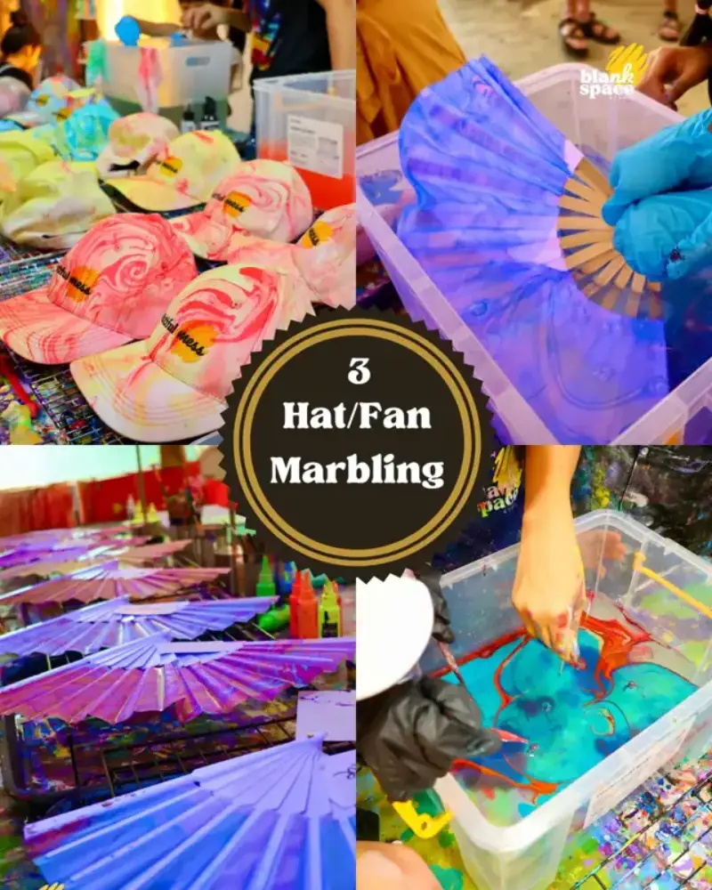Nón và quạt trắng trang trí bằng kỹ thuật marbling trong tiệc sinh nhật tại Blank Space Studio Saigon