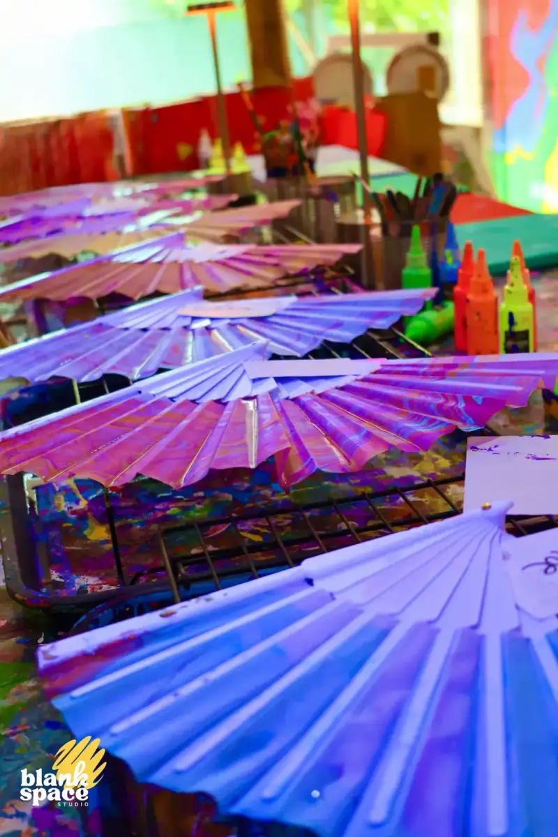 Marbled paper fans drying at Blank Space Studio Saigon