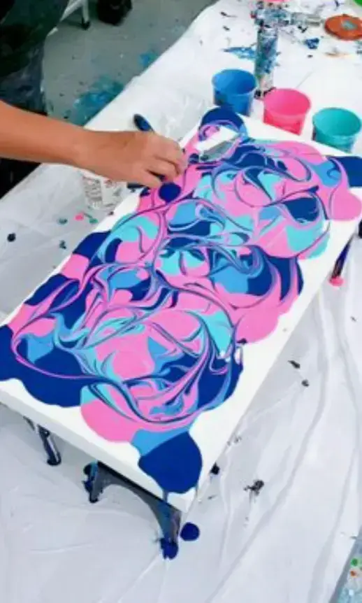 Color blend paint pour canvas created at a motion-paint session near Thao Dien
