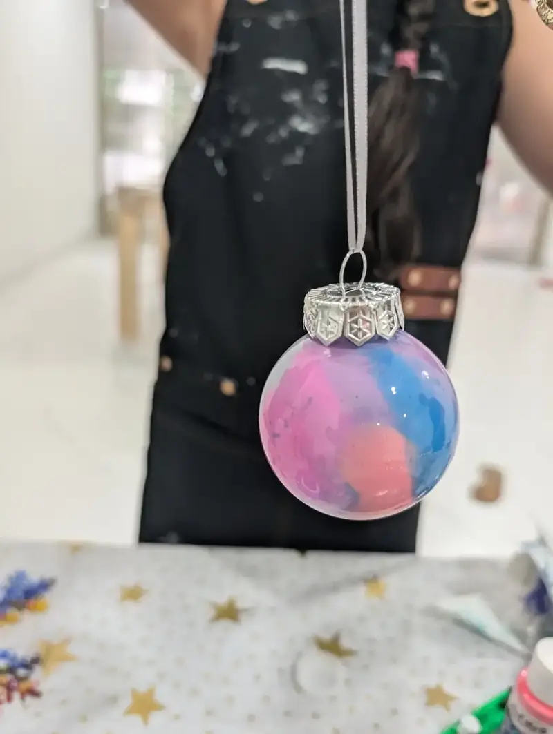 Pink and blue paint-poured ornament from a holiday camp in Ho Chi Minh City
