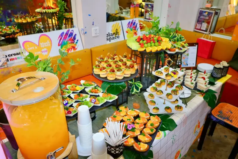 Full catering spread set up for a private studio party at Blank Space Studio