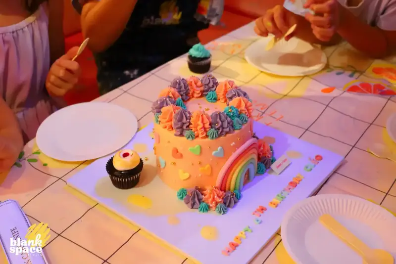 Custom birthday cake from our partner bakery at a private studio event in Saigon