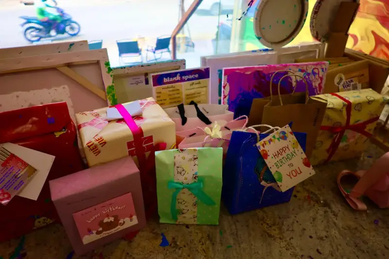 Gift display table set up for a private studio party at Blank Space Studio Saigon