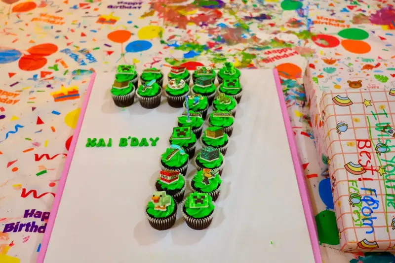 Themed cupcakes brought by guests for a private studio party in Ho Chi Minh City