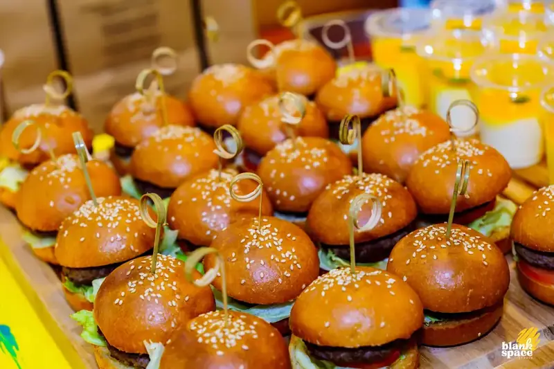 Food catering with mini burgers at a team event in Ho Chi Minh City